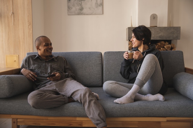 couple talking on couch